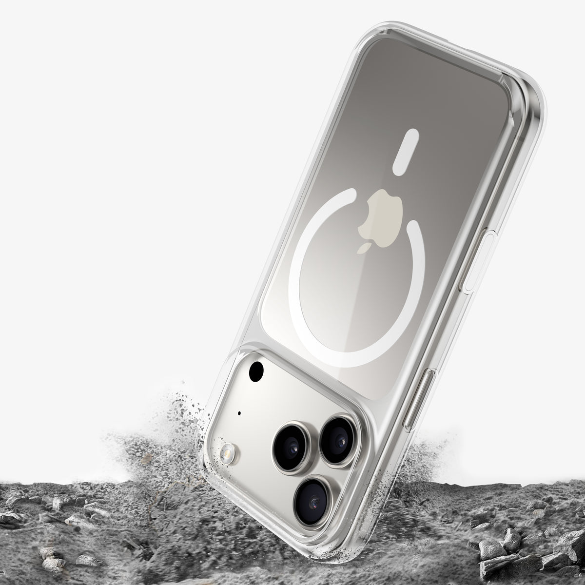 Téléphone en coque DANA plongeant dans du gravier, poussière soulevée au point d'impact