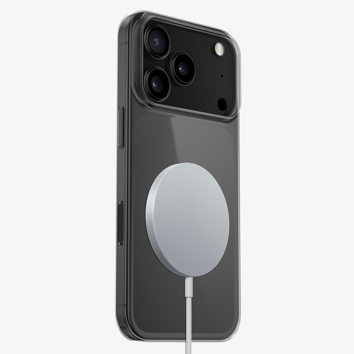 Chargeur sans fil circulaire posé sur le dos d'un téléphone en coque PHANTOM transparente