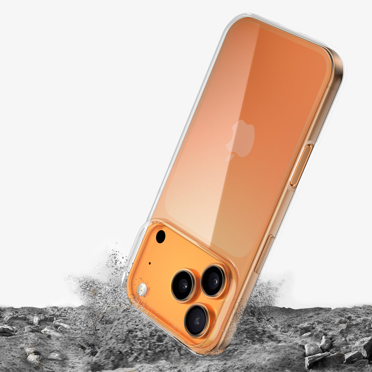 Téléphone orange en coque INVISIBLE plongeant dans du gravier, poussière soulevée à l'impact